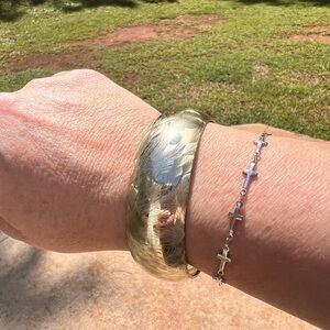 Gold bangle bracelet.